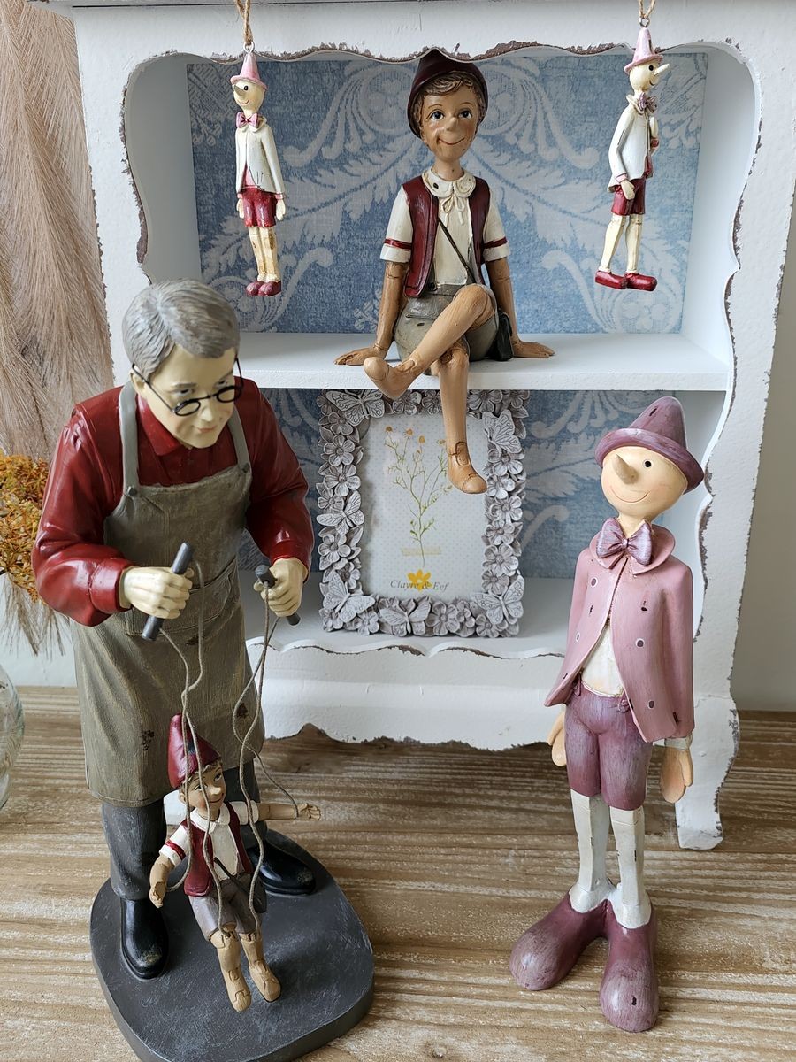 Závěsná dekorativní ozdoba Pinocchio - 3*3*11 cm Clayre & Eef Závěsná dekorativní ozdoba Pinocchio - 3*3*11 cm Clayre & Eef