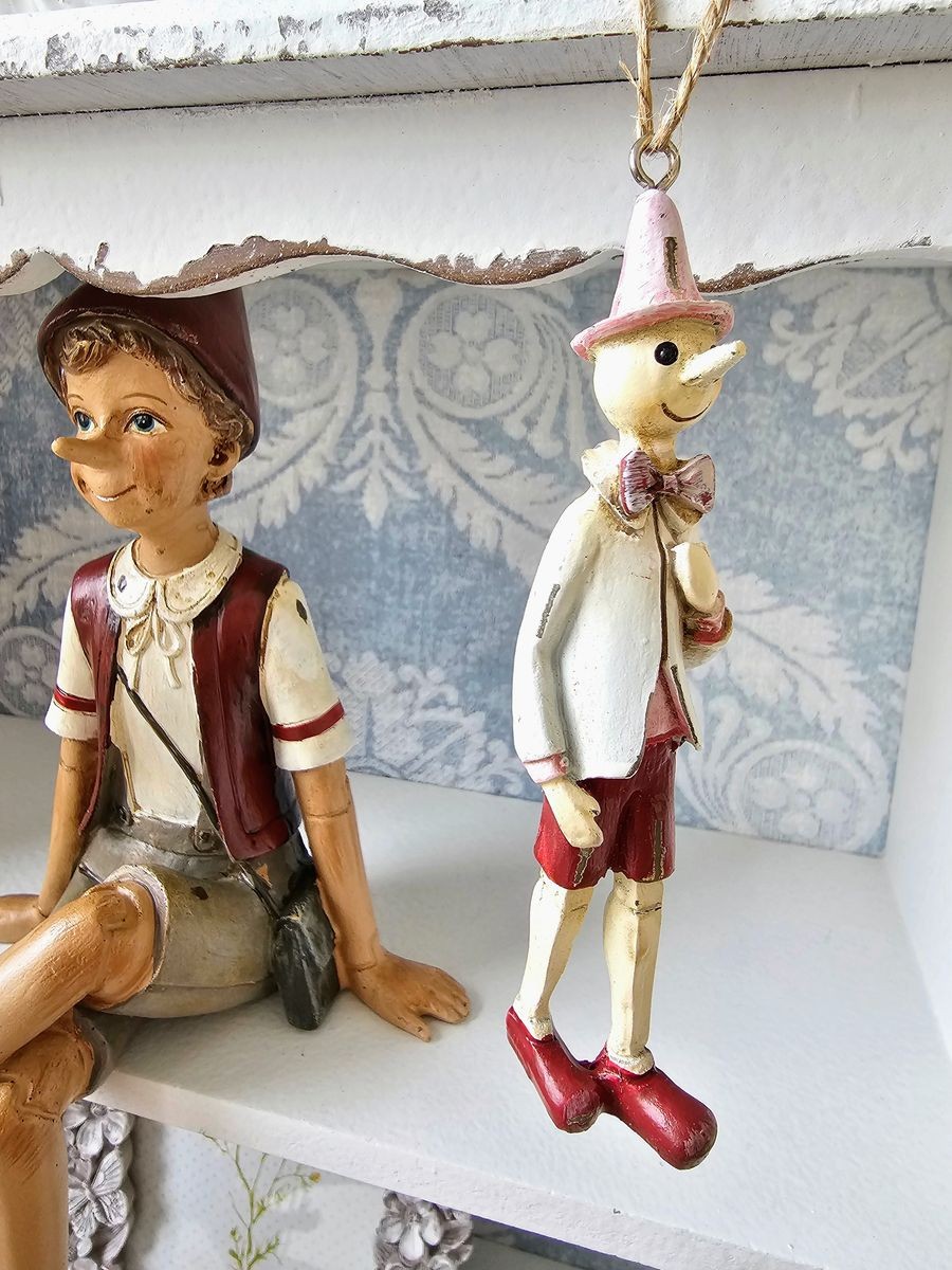 Dekorace sedící Pinocchio - 13*12*23 cm Clayre & Eef Dekorace sedící Pinocchio - 13*12*23 cm Clayre & Eef