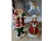 Červená vánoční dekorace socha Santa s dětmi - 10*8*21 cm Clayre & Eef