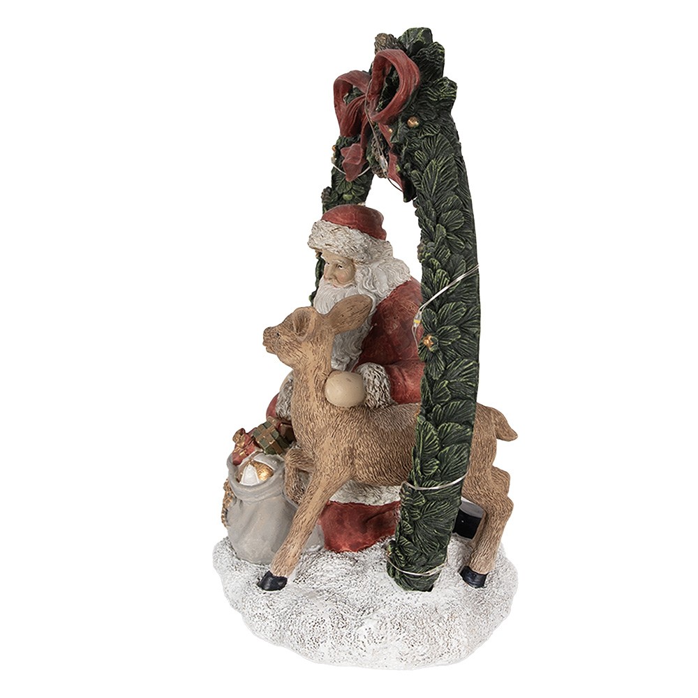 Vánoční dekorace Santa se srnečkou v zeleném věnci s Led - 19*12*23 cm Clayre & Eef Vánoční dekorace Santa se srnečkou v zeleném věnci s Led - 19*12*23 cm Clayre & Eef