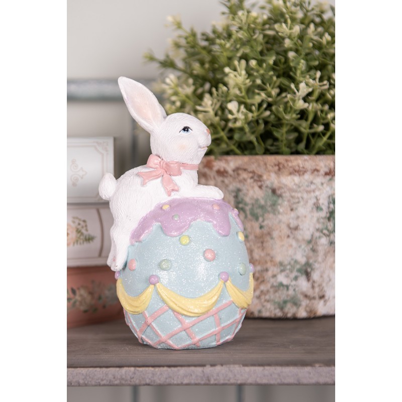 Dekorace králík s mašlí na modrém vajíčku - 9*9*17 cm Clayre & Eef Dekorace králík s mašlí na modrém vajíčku - 9*9*17 cm Clayre & Eef