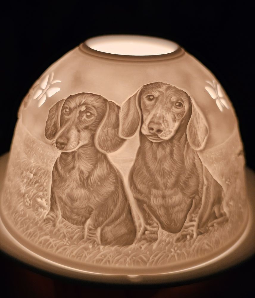 Bílý porcelánový svícen s jezevčíky Paollo - Ø 12*8 cm Clayre & Eef Bílý porcelánový svícen s jezevčíky Paollo - Ø 12*8 cm Clayre & Eef